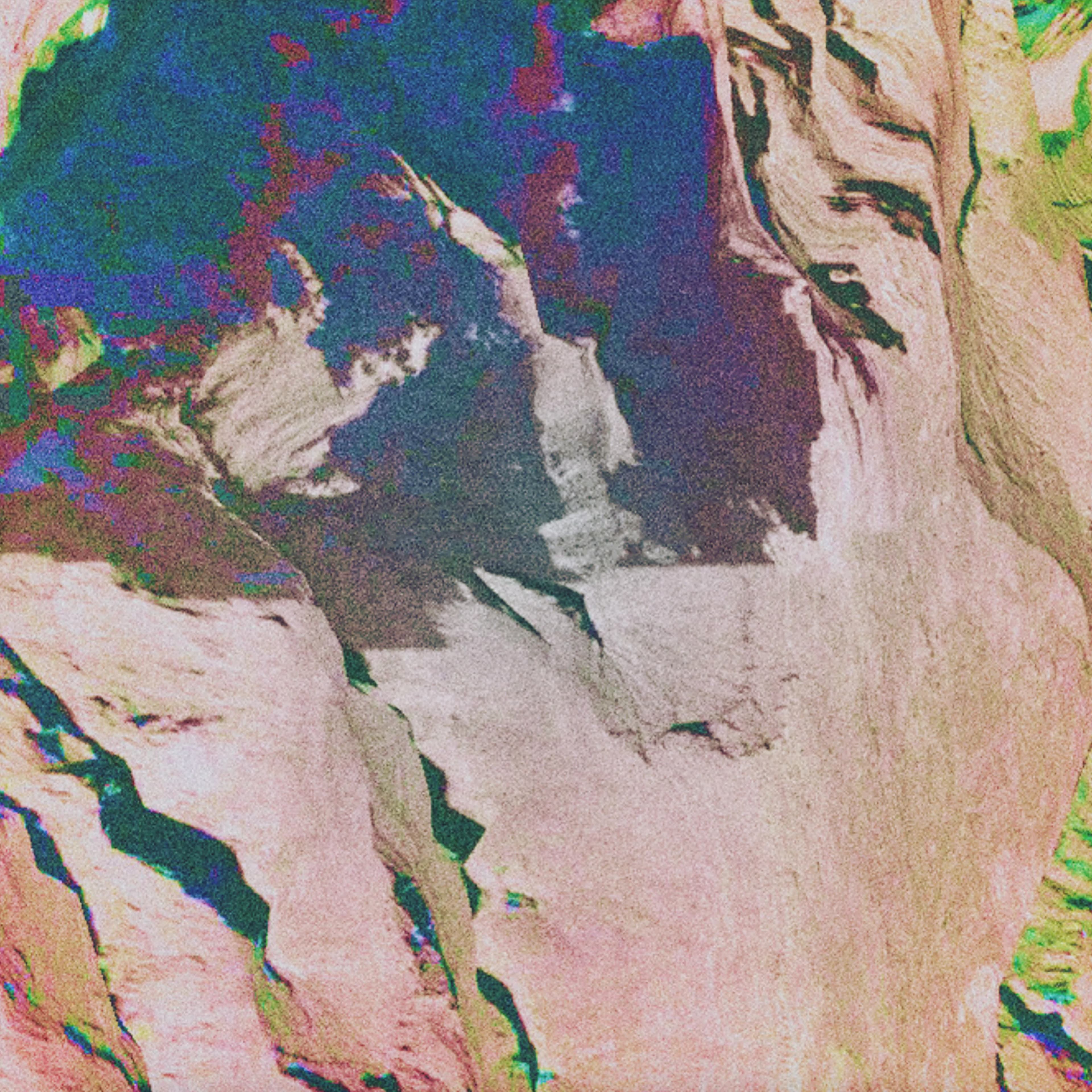 Grainy abstract image in pink, blue, green, and beige