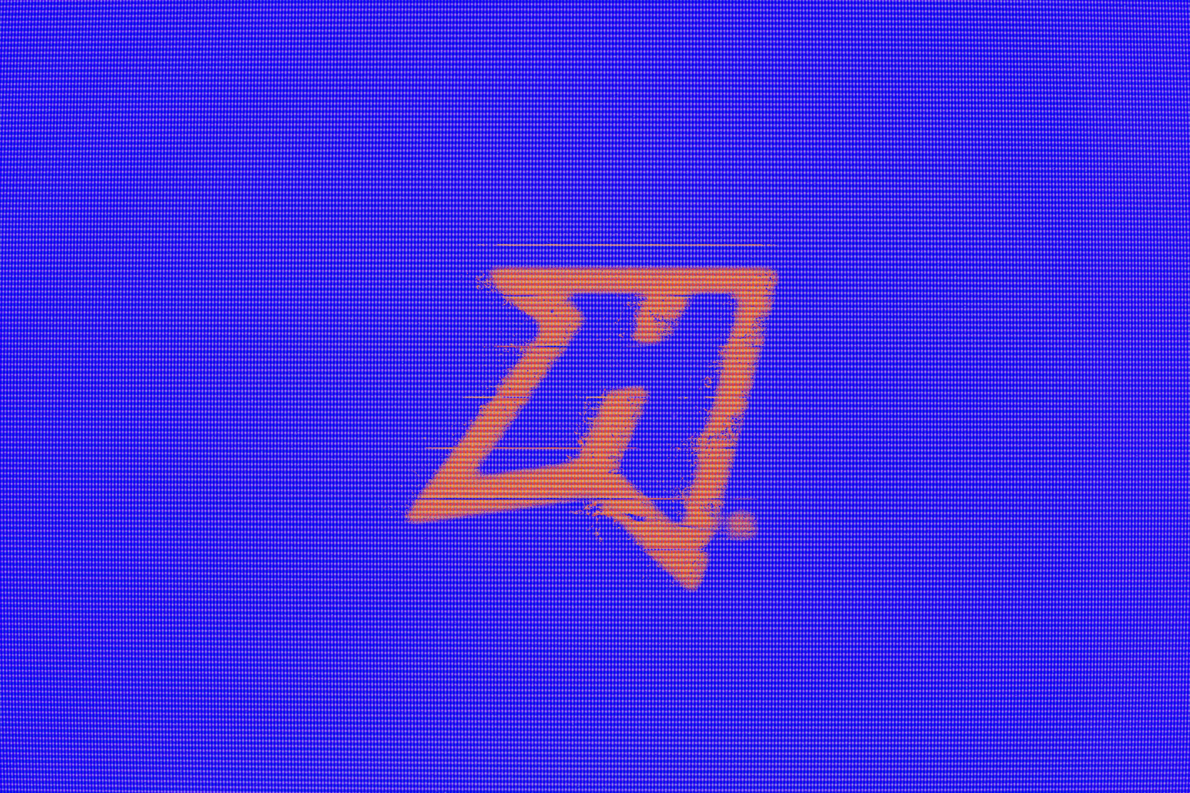 Orange angular monogram on an electric blue background
